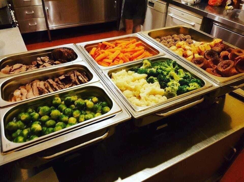 Sunday roast carvery with meats, roast potatoes and vegetables